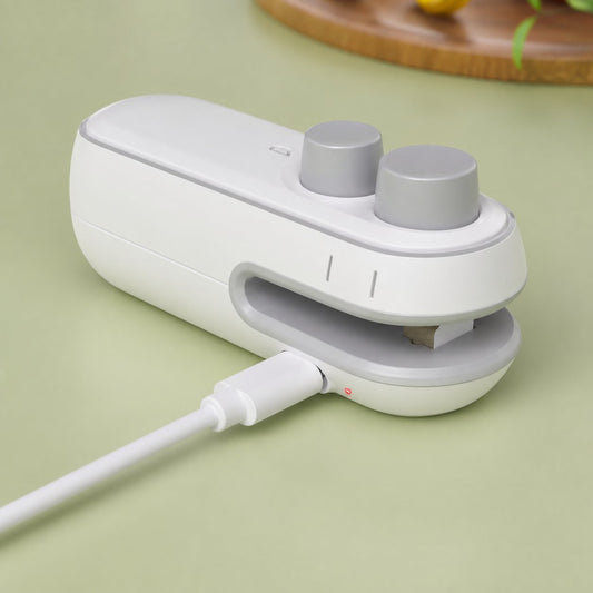 White bag sealer connected to its charging cable