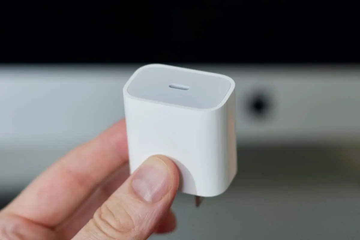 Compact Prelium 20W USB-C fast charger held in one hand
