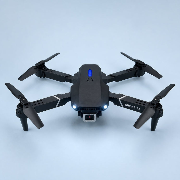 Black unfolded drone on pale blue
