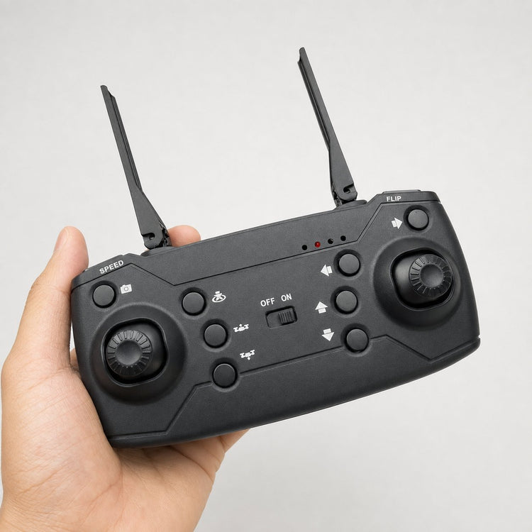 Drone controller held in a hand