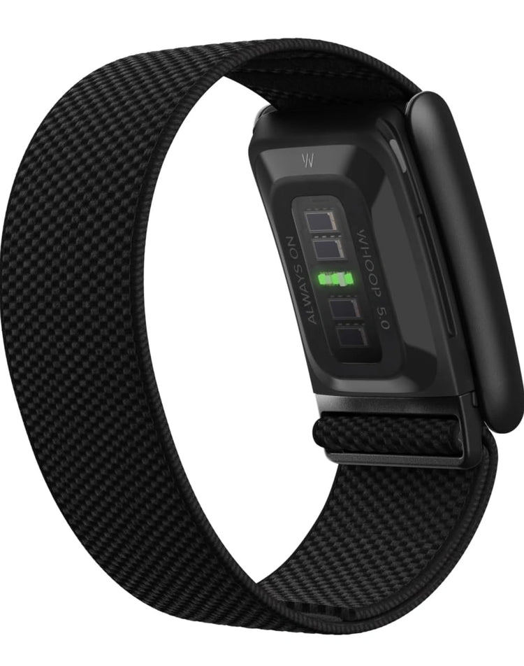 WHOOP 5.0 black tracker underside showing optical sensor and adjustable woven band